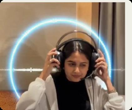 A creator wearing Hammer headphones