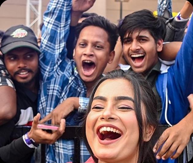 Fans cheering and taking a selfie at STANFEST